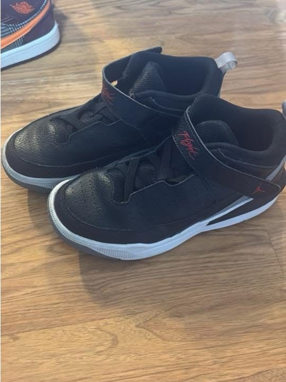 Nike Jordan’s Jump Black Kids' High-Top Sneakers with White Soles